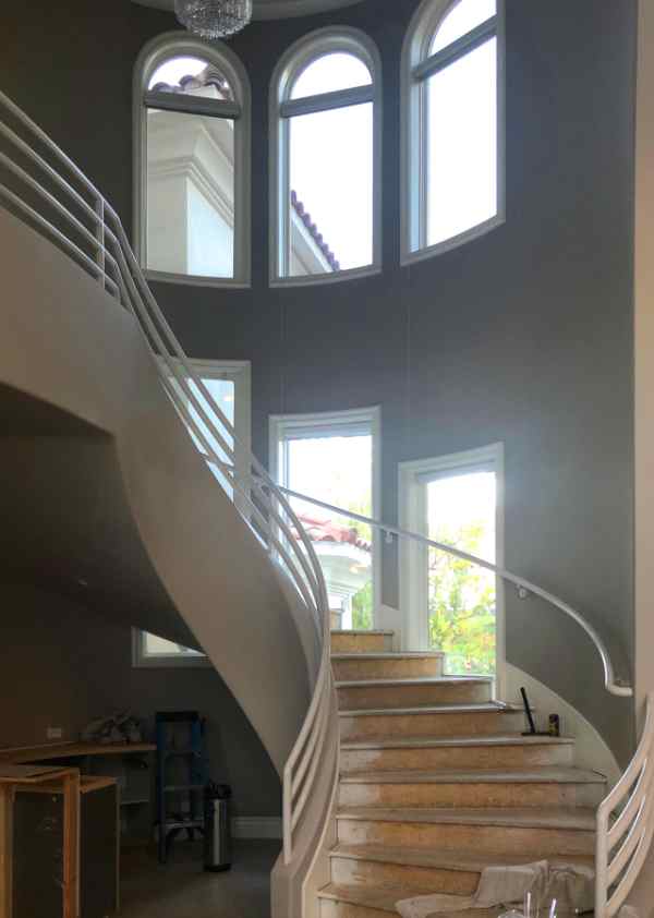 photo of home showing spiral staircase with several windows using nightvision 15% film